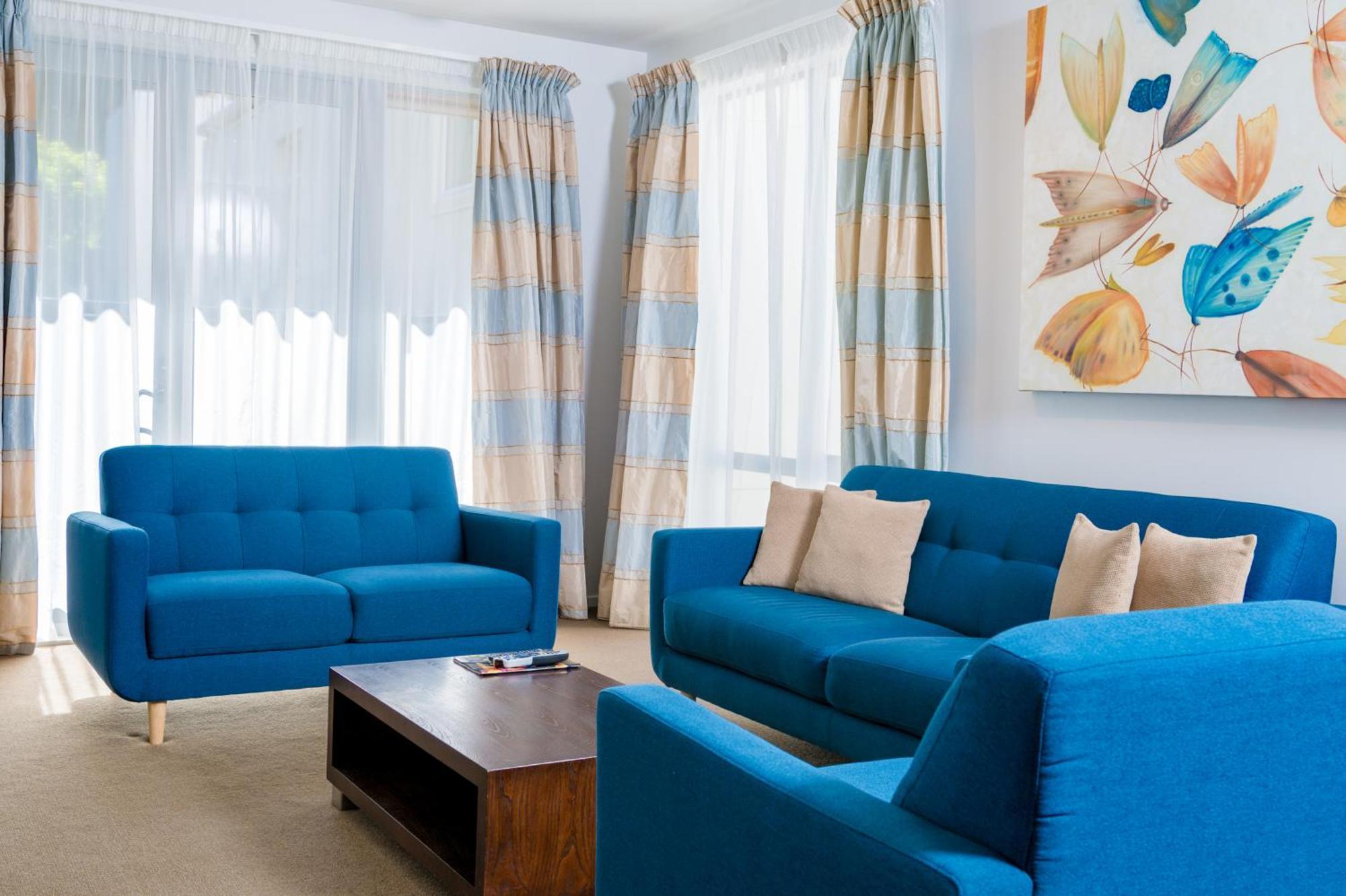 Boulcott Suites Wellington Kültér fotó A living room in a typical apartment
